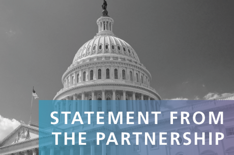 "STATEMENT FROM THE PARTNERSHIP" is shown in white against a blue to purple gradient rectangle. The U.S. Capitol is shown in the background in black and white.