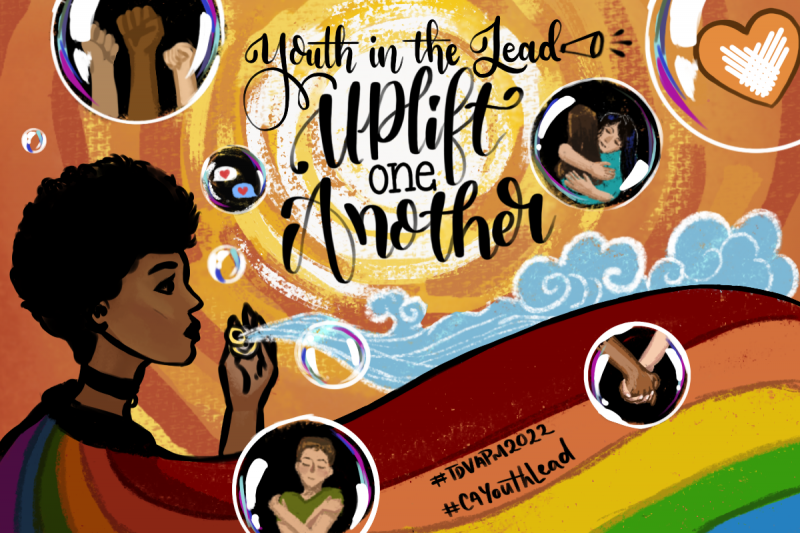 Against a multi-colored orange background, a Black person is wearing a multi-colored rainbow cape and blowing bubbles with various images inside: people holding hands, a person hugging themselves, raised fists, and an orange heart. Black text reads, "Youth in the Lead | Uplift one another" and "#TDVAPM2022" and "CAYouthLead".