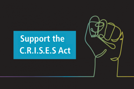 Against a black background, a vector of a raised fist is shown with a gradient color pattern, including purple, blue, green, and yellow. Next to it is a blue rectangle containing white text: "Support the C.R.I.S.E.S. Act".
