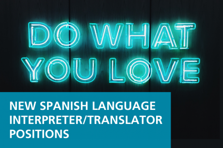 Against a black wooden fence, neon blue letters read, "DO WHAT YOU LOVE". Underneath is white text against a blue rectangle, reading, "NEW SPANISH LANGUAGE INTERPRETER/TRANSLATOR POSITION".